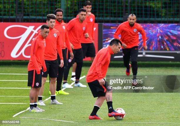 Chile's defender Gary Medel and teammates take part in a training session in Moscow on June 24, 2017 on the eve of the 2017 FIFA Confederations Cup...
