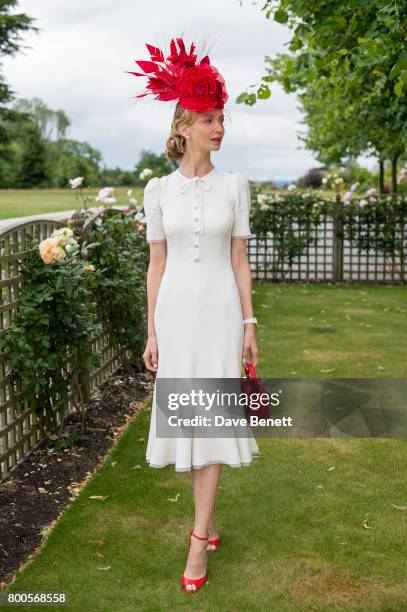 Tatiana Korsakova wearing a Dolce & Gabbana dress, Arturo Rios Hat, BUwood bag and Christian Louboutin shoes For Royal Ascot on June 24, 2017 in...