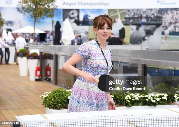 Ophelia Lovibond celebrates with Moet Ice Imperial in the Moet & Chandon Suite, whilst watching the action unfold on Centre Court, at the Aegon...