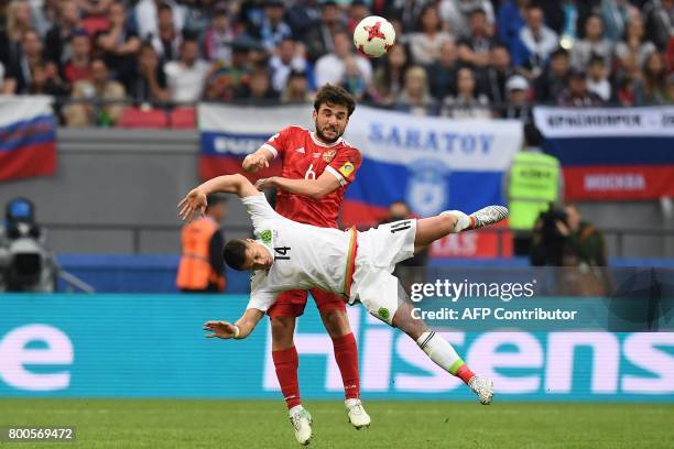 Mexico's forward Javier Hernandez fights for the ball against Russia's defender Georgiy Dzhikiya during the 2017 Confederations Cup group A football...