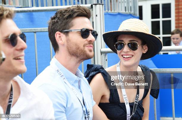 Jack Farthing, Tom Riley and Lizzy Caplan celebrate with Moet Ice Imperial in the Moet & Chandon Suite, whilst watching the action unfold on Centre...