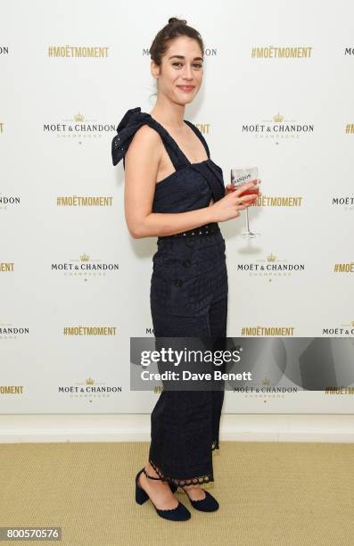 Lizzy Caplan celebrates with Moet Ice Imperial in the Moet & Chandon Suite, whilst watching the action unfold on Centre Court, at the Aegon...
