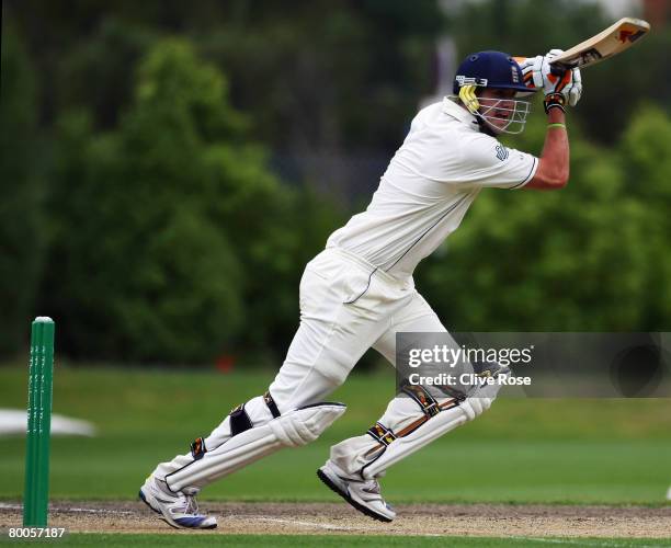 Kevin Pietersen of England drives during day two of the warm up match between a New Zealand Invitational XI and England at the University Oval on...