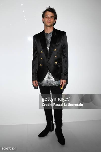 Brandon Flynn attends the Balmain Menswear Spring/Summer 2018 show as part of Paris Fashion Week on June 24, 2017 in Paris, France.