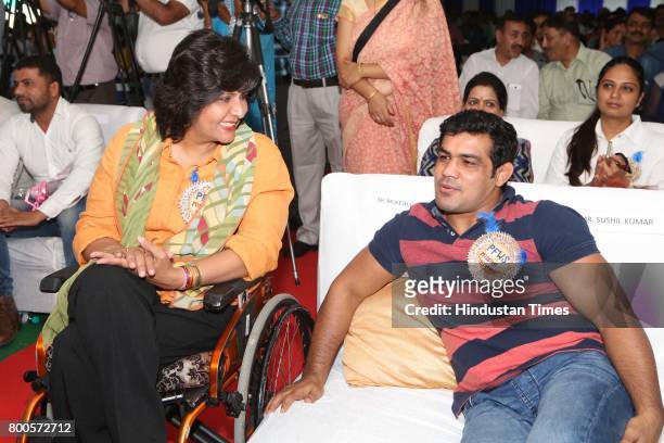 Wrestler Sushil Kumar and paralympian Deepa Malik during the launch of Neele Pankh, an initiative by Police Families Welfare Society to make sports a...
