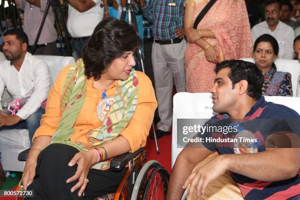 Wrestler Sushil Kumar and paralympian Deepa Malik during the launch of Neele Pankh, an initiative by Police Families Welfare Society to make sports a...