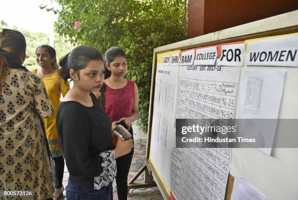 Students and parents busy during an admission process for the new Academic Year 2017-18, at Lady Shri Ram College, on June 24, 2017 in New Delhi,...