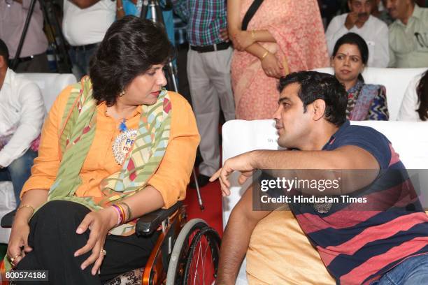 Wrestler Sushil Kumar and paralympian Deepa Malik during the launch of Neele Pankh, an initiative by Police Families Welfare Society to make sports a...