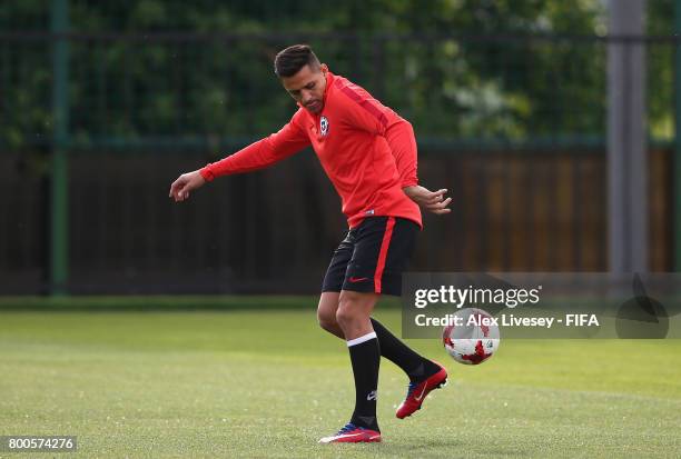 Alexis Sanchez of Chile controls the ball during a training session at the Strogino Training Ground during the FIFA Confederations Cup Russia 2017 on...