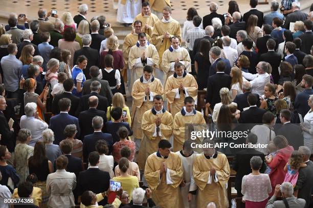 Newly elevated priests and deacons attend an ordination Mass at Notre Dame de l'épine basilica in Evron, on June 24, 2017. The Saint Martin Community...