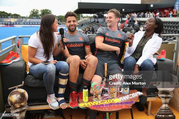 Netherlands players speak on the social sofa after the semi-final match between England and the Netherlands on day eight of the Hero Hockey World...