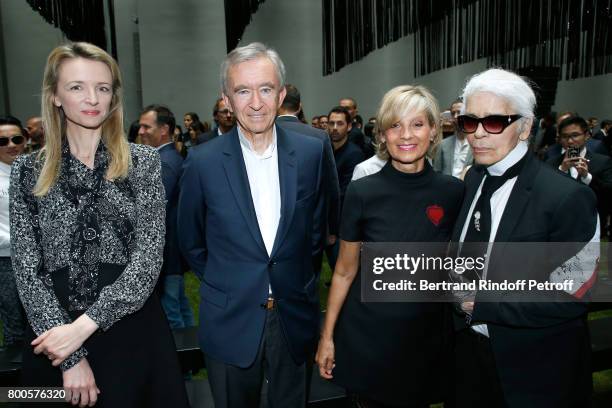 Louis Vuitton's executive vice president Delphine Arnault, Owner of LVMH Luxury Group Bernard Arnault, his wife Helene Mercier-Arnault and Stylist...