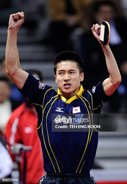 Japan's Yoshida Kaii celebrates after defeating Taiwan Chuan Chihyuan during the men's quarter-final and position match at the World Team Table...