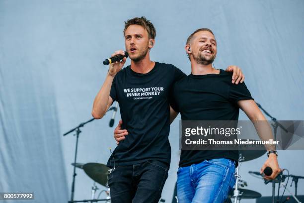 Clueso performs with TV host Klaas Heufer-Umlauf during the second day of the Southside festival on June 24, 2017 in Neuhausen, Germany.