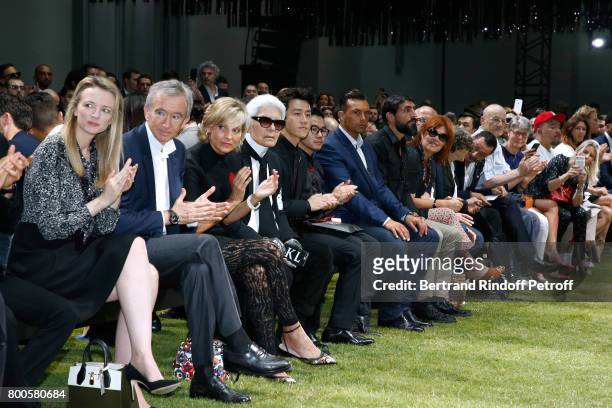 Louis Vuitton's executive vice president Delphine Arnault, Owner of LVMH Luxury Group Bernard Arnault, his wife Helene Mercier-Arnault, Stylist Karl...
