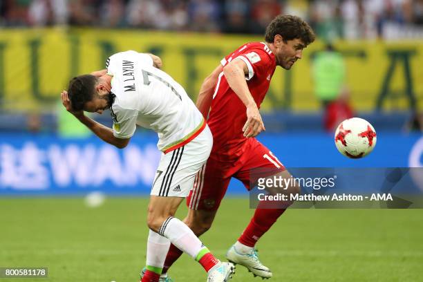 Yuri Zhirkov of Russia clashes with Miguel Layun of Mexico prior to his sending off during the FIFA Confederations Cup Russia 2017 Group A match...