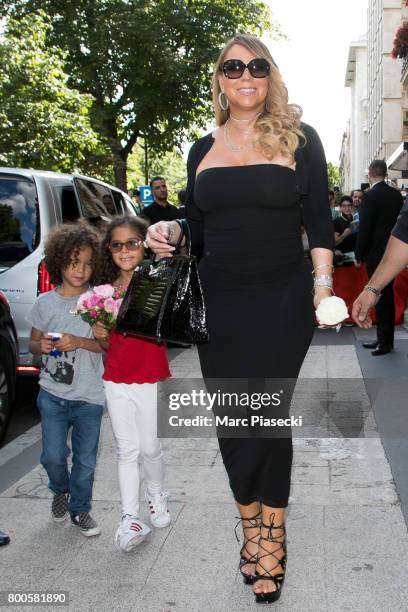 Singer Mariah Carey, Monroe Cannon and Moroccan Scott Cannon leave the Plaza Athenee Dorchester Collection Hotel on Avenue Montaigne on June 24, 2017...