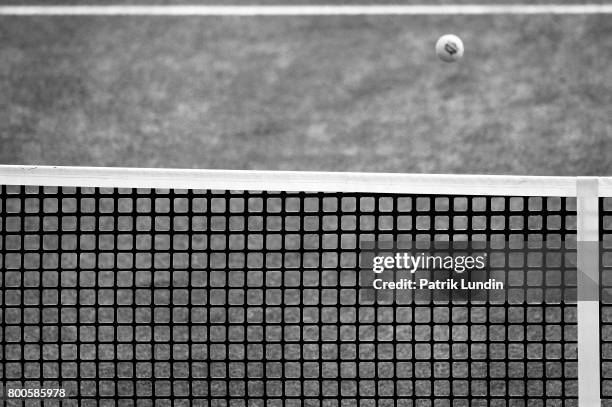 The ball flies over the net on day six at Queens Club on June 24, 2017 in London, England.