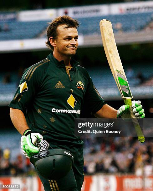 Adam Gilchrist of Australia waves goodbye to the crowd after being dismissed and playing his last game on the the MCG during the Commonwealth Bank...