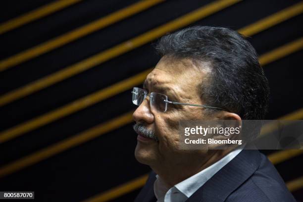 German Ferrer, deputy of the National Assembly for the United Socialist Party of Venezuela , listens during an interview in Caracas, Venezuela, on...