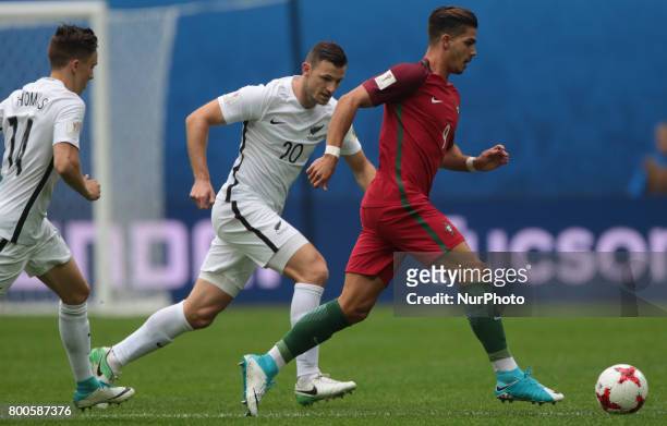 Tommy Smith of the New Zealand national football team and André Silva of the Portugal national football team vie for the ball during the 2017 FIFA...