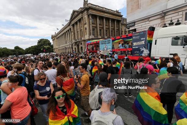People take part in the annual Gay Pride homosexual, bisexual and transgender visibility march on June 24, 2017 in Paris.