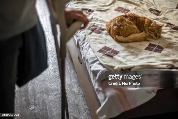 Sergiy Tarasiuk, ATO veteran, stands at his apartment in Irpin, Kyiv region, Ukraine. Sergiy Tarasiuk lost his left leg in 2014 after 3 months of the...