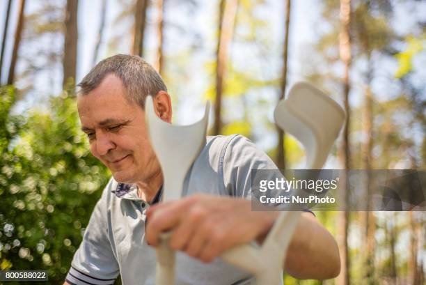 Sergiy Tarasiuk, ATO veteran, spends time in the park near his home in Irpin, Kyiv region, Ukraine. Sergiy Tarasiuk lost his left leg in 2014 after 3...