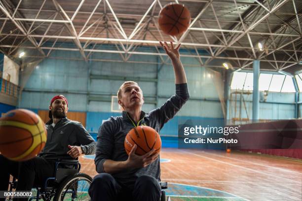 Players of Kyiv BASKI wheelchair basketball team have their training at the sports center Voskhod in Kyiv, Ukraine. The team was created 3 months ago...