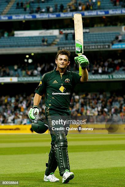 Adam Gilchrist of Australia waves goodbye to the crowd after being dismissed and playing his last game on the the MCG during the Commonwealth Bank...