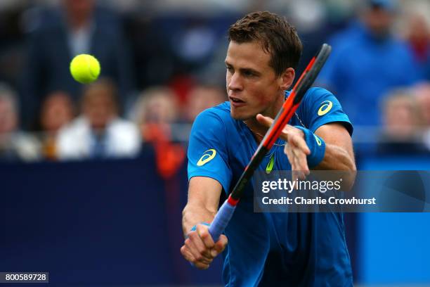 Vasek Pospisil of Canada in action during his qualifying match against James Ward of Great Britain during Qualifying on Day 2 of The Aegon...