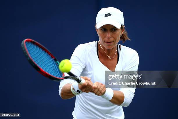 Varvara Lepchenko of the United States in action during her qualifying match against Risa Ozaki of Japan during Qualifying on Day 2 of The Aegon...