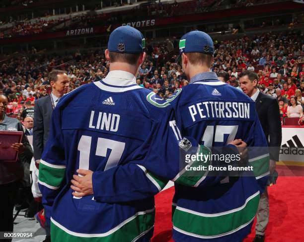 Elias Pettersson, right, and Kole Lind pose for photos after being drafted by the Vancouver Canucks during the 2017 NHL Draft at the United Center on...