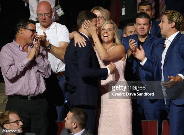 Matthew Strome celebrates with his family after being selected 106th overall by the Philadelphia Flyers during the 2017 NHL Draft at United Center on...