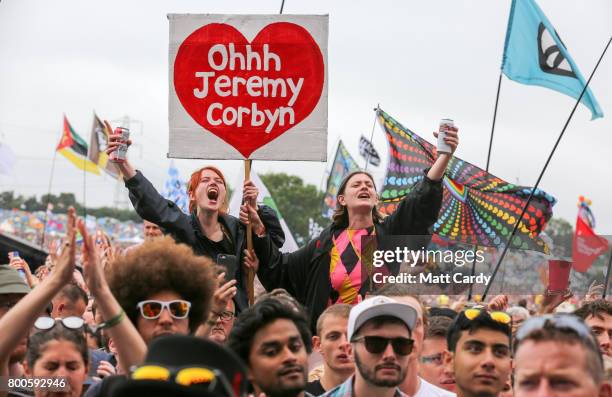 Crowds cheer Labour Party leader Jeremy Corbyn address the crowd from the main stage a the Glastonbury Festival site at Worthy Farm in Pilton on June...