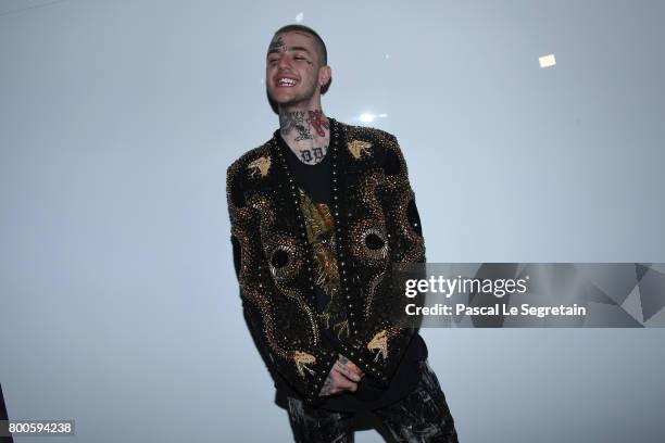 Lil Peep attends the Balmain Menswear Spring/Summer 2018 show as part of Paris Fashion Week on June 24, 2017 in Paris, France.