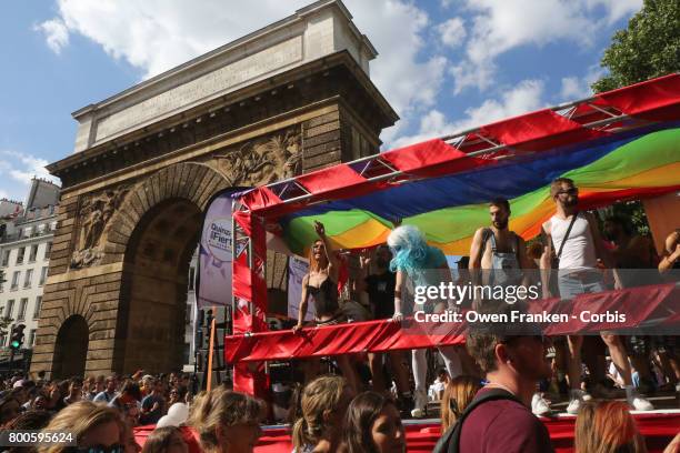 The Gay Pride Parade rally and march passes the arch of Porte St. Martin on June 24, 2017 in Paris, France.