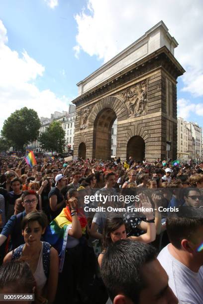 The Gay Pride Parade rally and march passes the arch of Porte St. Martin on June 24, 2017 in Paris, France.