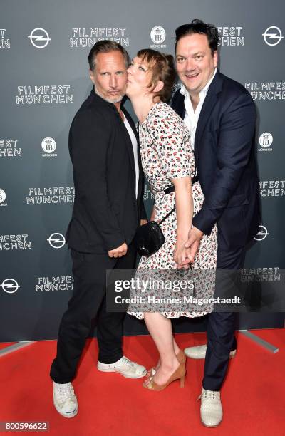 Actor Benno Fuermann, Lina Beckmann and Charly Huebner attend the 'Fuehlen Sie sich manchmal ausgebrannt und leer?' Premiere during Munich Film...