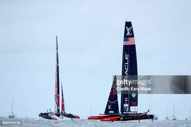 Skippered by Jimmy Spithill competes with Emirates Team New Zealand helmed by Peter Burling in race 6 during day 3 of the America's Cup Match...