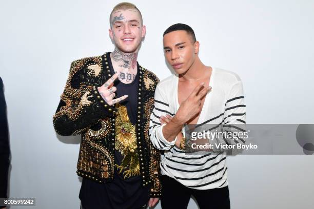 Lil Peep poses with designer Olivier Rousteing after the Balmain Menswear Spring/Summer 2018 show as part of Paris Fashion Week on June 24, 2017 in...
