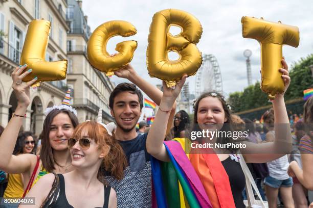 People participate in the Gay Pride Parade rally and march in the streets on June 24, 2017 in Paris, France. 2017 marks the 40th anniversary of the...