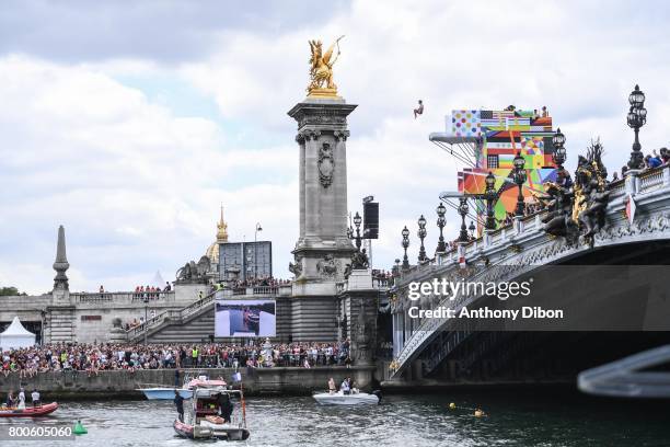 Diver jump from The Pont Alexander III during the Olympic Day, Paris Olympic Park comes to life for Olympic Day on June 24, 2017 in Paris, France.