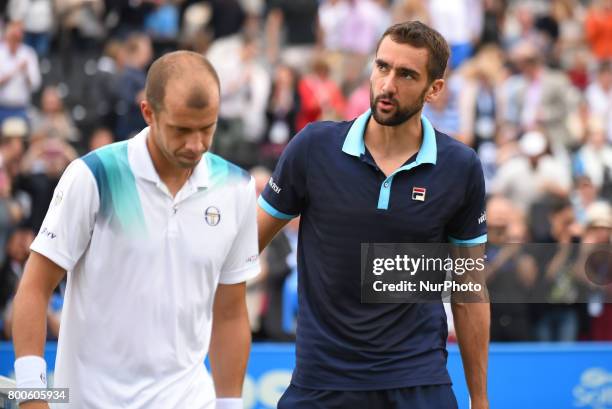 Marin Cilic of Croatia salutes Gilles Muller of Luxembourg after winning the semi final of AEGON Championships at Queen's Club, London, on June 24,...