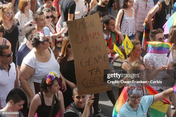 People participate in the Gay Pride Parade rally and march in the streets on June 24, 2017 in Paris, France.