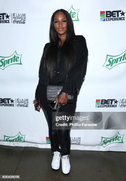 Jackie Christie poses backstage at the Celebrity Basketball Game, presented by Sprite and State Farm, during the 2017 BET Experience, at Staples...