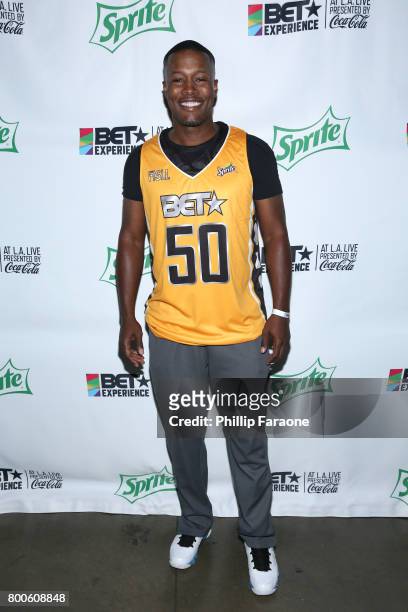 Flex Alexander poses backstage at the Celebrity Basketball Game, presented by Sprite and State Farm, during the 2017 BET Experience, at Staples...