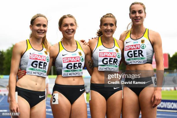 Germany Women's 4x100m relay team members Lara Matheis, Alexandra Burghardt, Gina Luckenkemper and Rebekka Haase pose for a picture after winning...