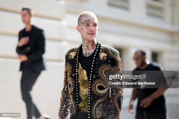 Lil Peep attends the Balmain Menswear Spring/Summer 2018 show as part of Paris Fashion Week on June 24, 2017 in Paris, France.