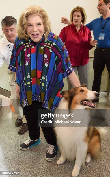 President and CEO of The Annenberg Foundation, Wallis Annenberg and Lassie the dog at the grand opening of The Wallis Annenberg PetSpace on June 24,...